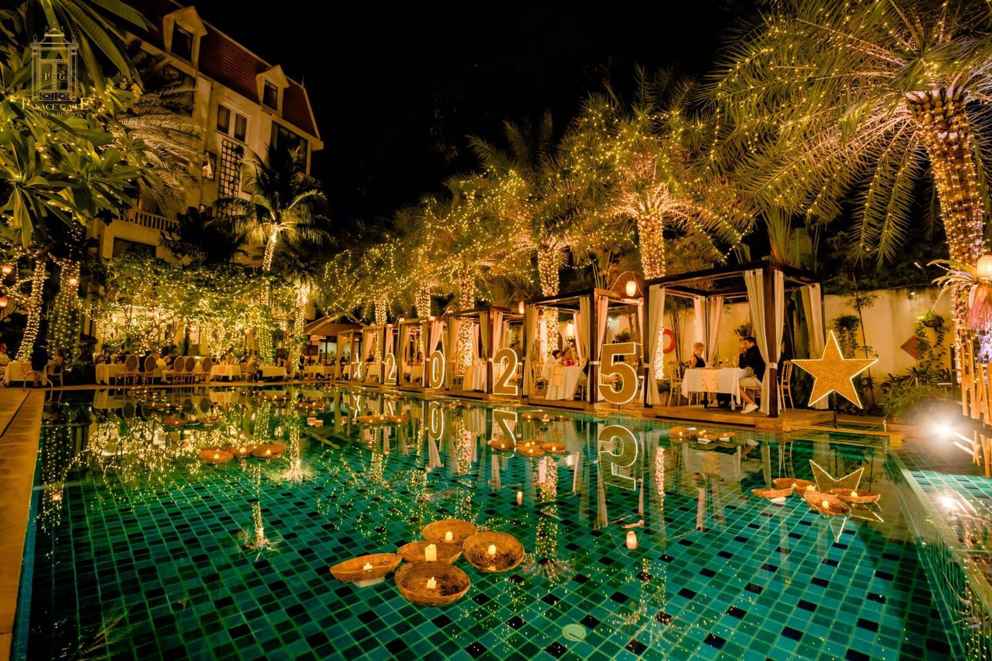 Palace Gate Hotel & Resort By Ehm Пном Пен Екстериор снимка The pool at the hotel